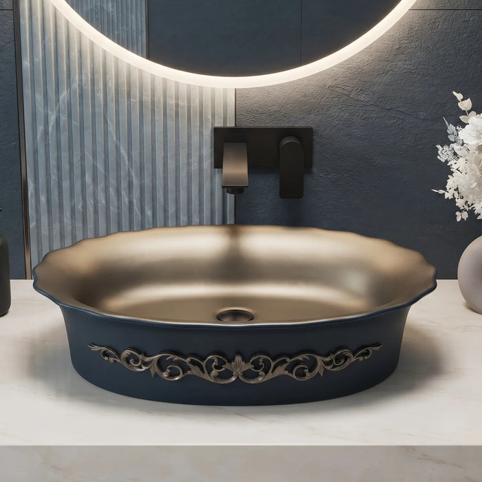 Black and champagne gold royal floral oval table top wash basin 580x370x150 mm featuring matte black exterior, metallic gold interior, antique gold ornamental scrollwork and scalloped rim for luxury bathroom countertops.