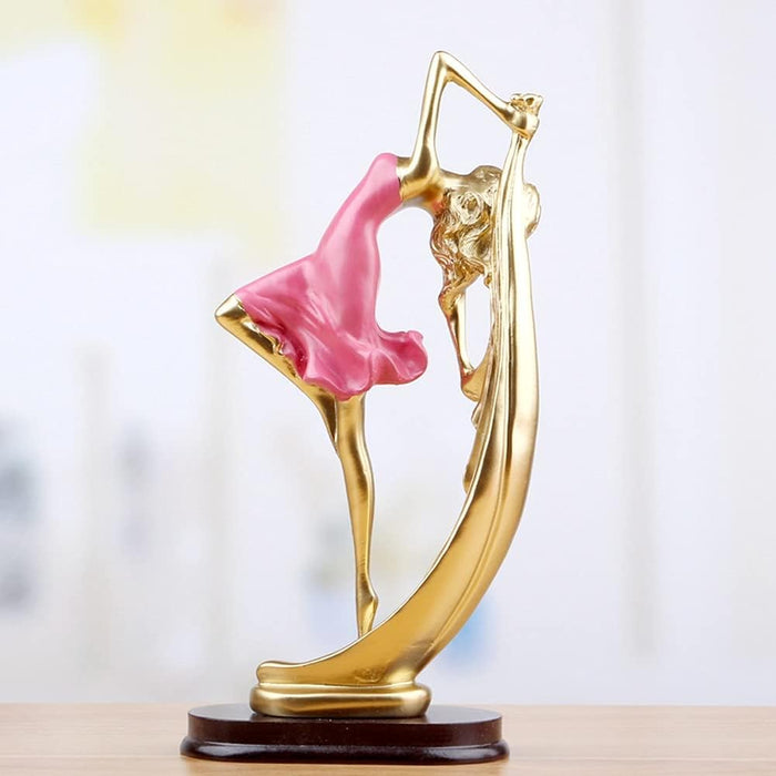 Elegant Golden Dancer Sculpture with Flowing Pink Dress – Modern Art Figurine for Home Decor (BSP-1230) L 11 W 6 H 21 CM