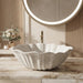 White seashell design table top wash basin 470x390x170 mm featuring elegant scalloped wavy edges, vertically ribbed shell texture and natural speckled finish, luxury designer countertop bathroom sink for modern bathrooms.
