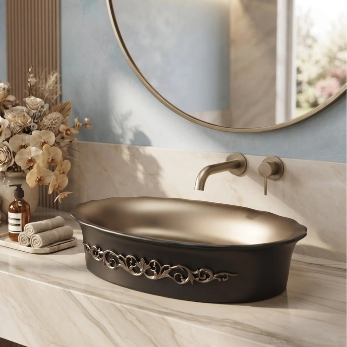 Black and champagne gold royal floral oval table top wash basin 580x370x150 mm featuring matte black exterior, metallic gold interior, antique gold ornamental scrollwork and scalloped rim for luxury bathroom countertops.