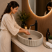 Bassino beige fluted table top wash basin 485 × 355 × 135 mm with textured ribbed design for modern luxury bathroom countertops.