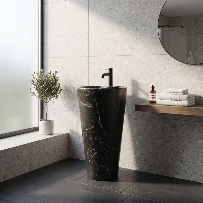 Black marble-effect ceramic pedestal wash basin with tapered freestanding design, integrated bowl and 390 × 390 × 820 mm size for modern luxury bathrooms.