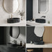 Black marble finish oval table top wash basin with white veining, sculpted vertical fluted exterior and 20 inch countertop design for modern luxury bathrooms.