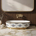 Blue and gold floral design oval table top wash basin 560x385x150 mm featuring glossy white interior, intricate ornamental blue patterns, elegant gold rim and base accents, luxury designer countertop bathroom sink.