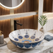 Decorative round table top wash basin 400 × 400 × 125 mm with glossy white finish, intricate blue and gold pattern, designed for luxury modern bathrooms.