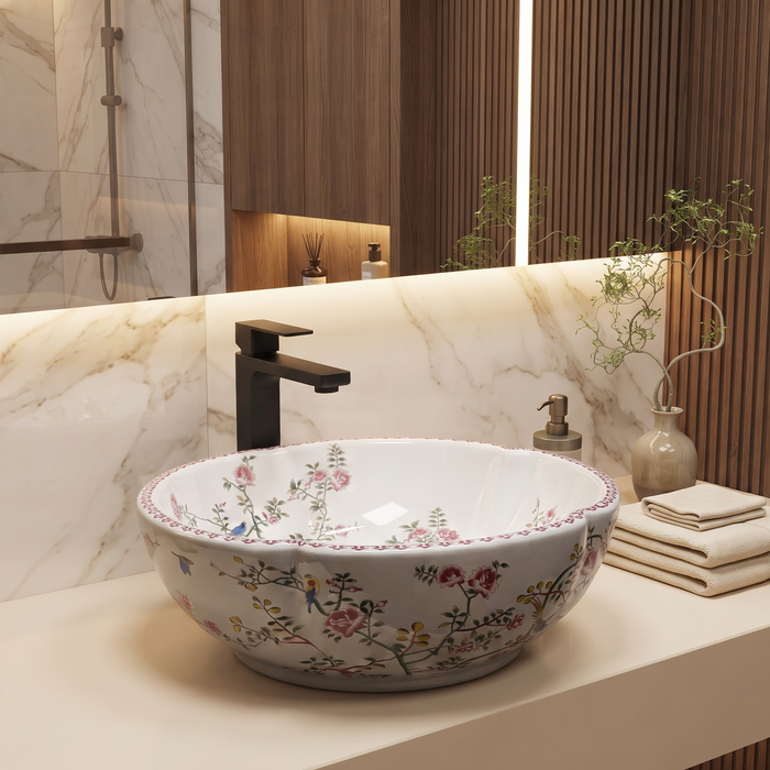 Designer floral ceramic table top wash basin with pink flowers, bird pattern and decorative rim, 420 × 420 × 150 mm countertop basin.