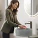 Grey artificial stone round table top wash basin with textured exterior, smooth interior and 400x400x160 mm dimensions for modern luxury bathrooms.