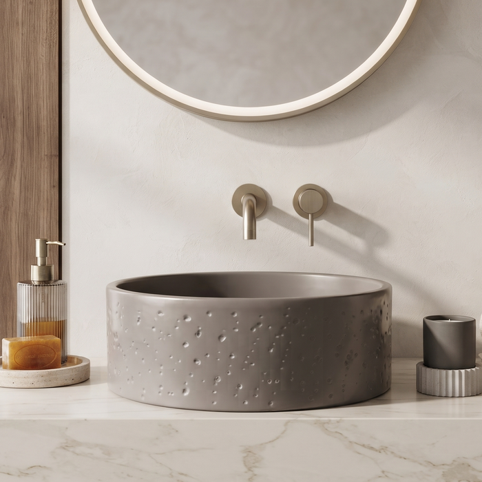 Grey artificial stone round table top wash basin with textured exterior, smooth interior and 400x400x160 mm dimensions for modern luxury bathrooms.