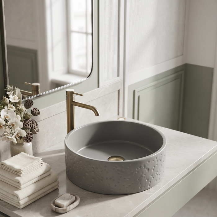 Grey artificial stone round table top wash basin with textured exterior, smooth interior and 400x400x160 mm dimensions for modern luxury bathrooms.