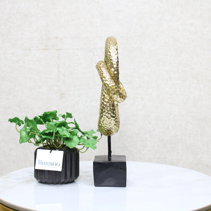 Gold Spiral Loop Sculpture, designed with a hammered-texture finish The abstract spiral form adds movement and dimension, making it an eye-catching accent for console tables, bookshelves, or office desks. BSP-8216 L 18 W 7 H 29