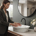 Ivory beige marble finish oval table top wash basin 580x370x150 mm featuring glossy white and beige marble pattern, elegant scalloped rim and spacious bowl for luxury bathroom countertops.