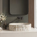 Ivory white marble finish oval table top wash basin with beige veining, vertical fluted exterior and 20 inch countertop design for modern luxury bathrooms.