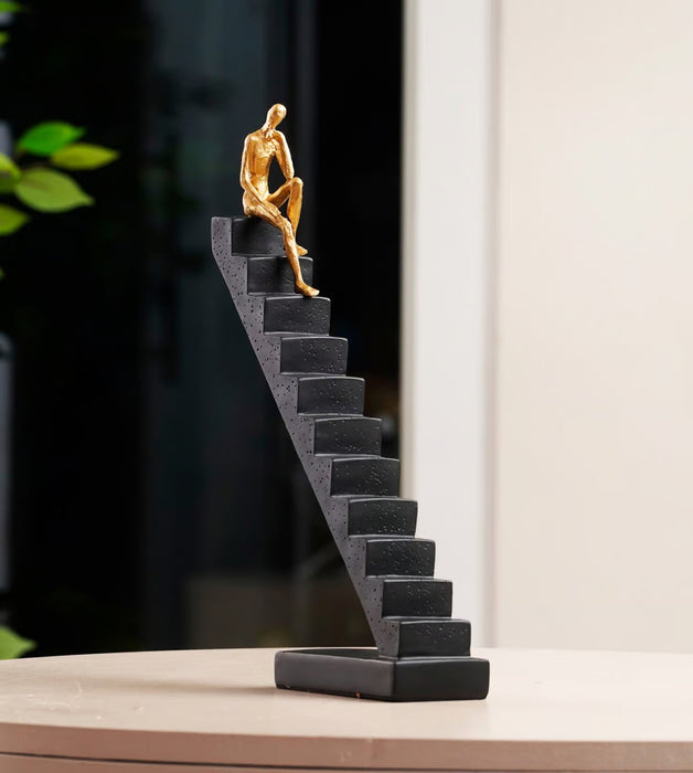 The Ascent of Reflection Resin Human on Stairs Table Showpiece (BSP-8057) L 29 W 7 H 35 CM