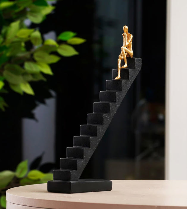 The Ascent of Reflection Resin Human on Stairs Table Showpiece (BSP-8057) L 29 W 7 H 35 CM
