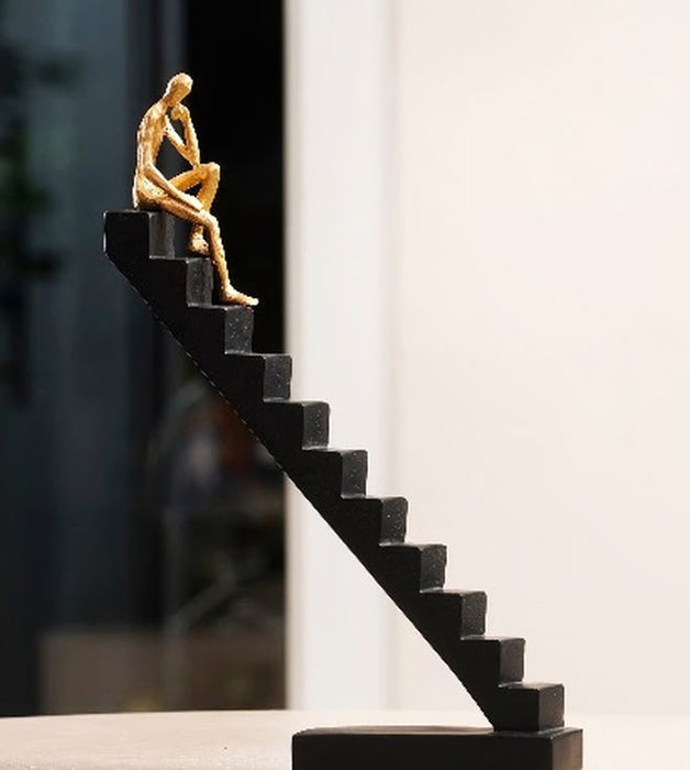 The Ascent of Reflection Resin Human on Stairs Table Showpiece (BSP-8057) L 29 W 7 H 35 CM