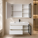 Modern white floating vanity cabinet displayed with open drawers and illuminated upper storage compartments.