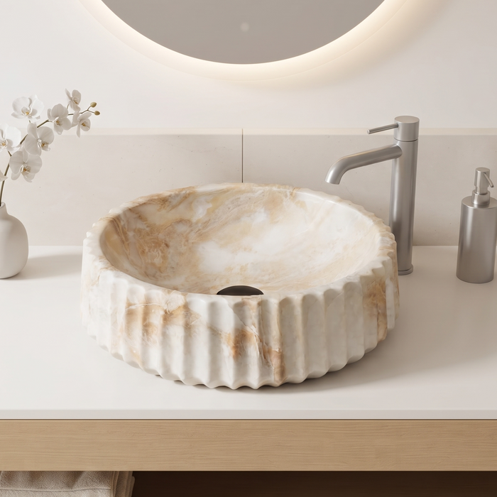 Round white and beige marble-finish table top wash basin with fluted exterior design and 370 × 370 × 135 mm size.