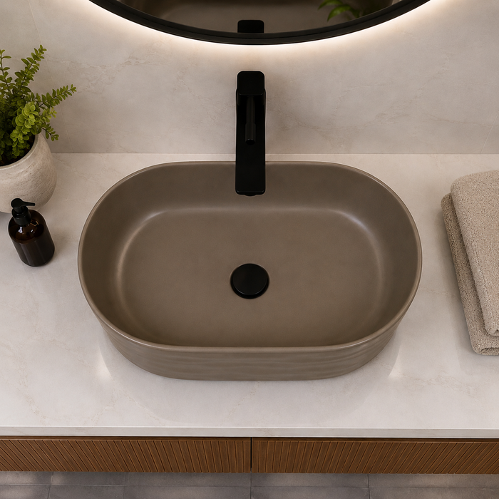 Taupe tabletop wash basin with a matte finish and wave-textured exterior, shown from multiple angles in a modern bathroom setting.