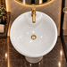 White and gold ceramic pedestal wash basin with glossy finish, sculpted cylindrical design and 440 × 440 × 820 mm size for modern luxury bathrooms.