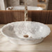 White floral design oval table top wash basin 580x370x150 mm featuring elegant grey botanical line art, glossy white appearance, scalloped curved rim and decorative floral patterns for luxury bathroom countertops.