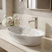 White floral design oval table top wash basin 580x370x150 mm featuring elegant grey botanical line art, glossy white appearance, scalloped curved rim and decorative floral patterns for luxury bathroom countertops.