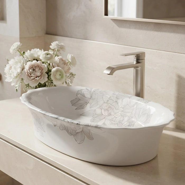 White floral design oval table top wash basin 580x370x150 mm featuring elegant grey botanical line art, glossy white appearance, scalloped curved rim and decorative floral patterns for luxury bathroom countertops.