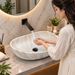 White marble finish artificial stone table top wash basin, 600×380×200 mm, matte oval countertop sink for modern luxury bathrooms.