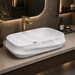 White marble pattern matte ceramic table top wash basin, 600x430x150 mm, with sculpted rectangular design for modern luxury bathrooms.