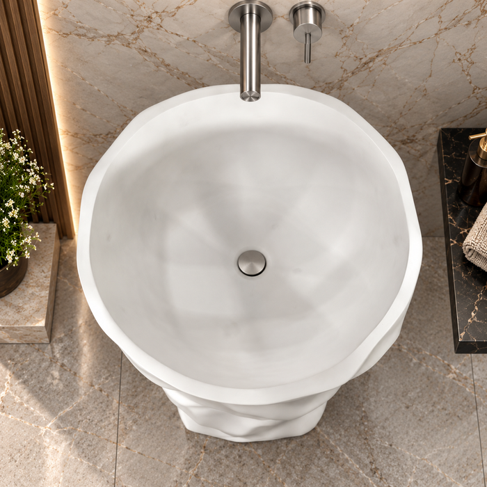 White sculptural freestanding pedestal wash basin 17.7 x 17.7 x 33.9 inch with irregular textured design for modern luxury bathroom interior.
