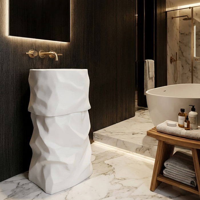 White sculptural freestanding pedestal wash basin 17.7 x 17.7 x 33.9 inch with irregular textured design for modern luxury bathroom interior.